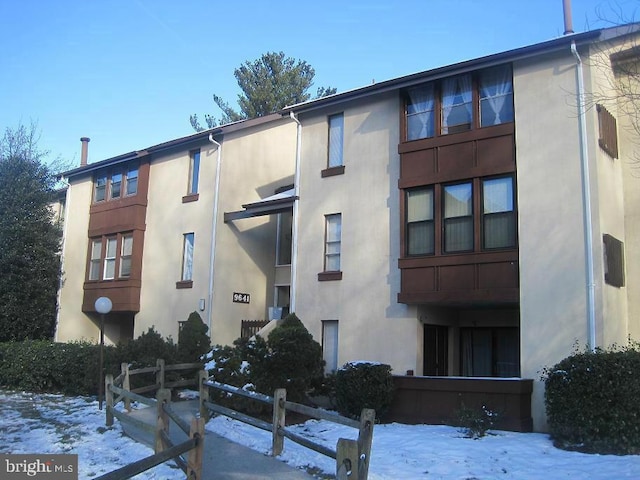 view of snow covered building