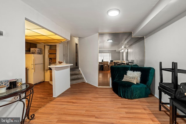 sitting room with light wood-type flooring