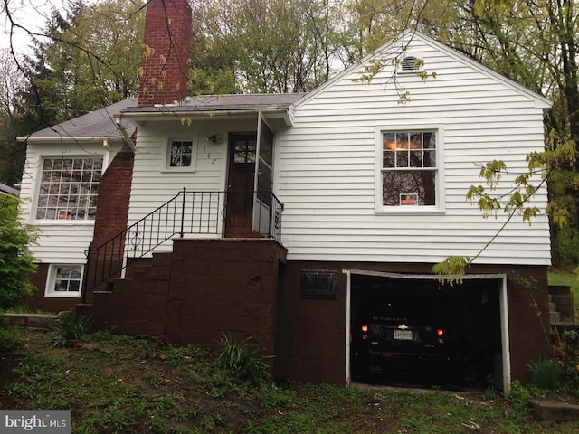 view of front of property with a garage