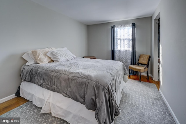 bedroom featuring hardwood / wood-style floors