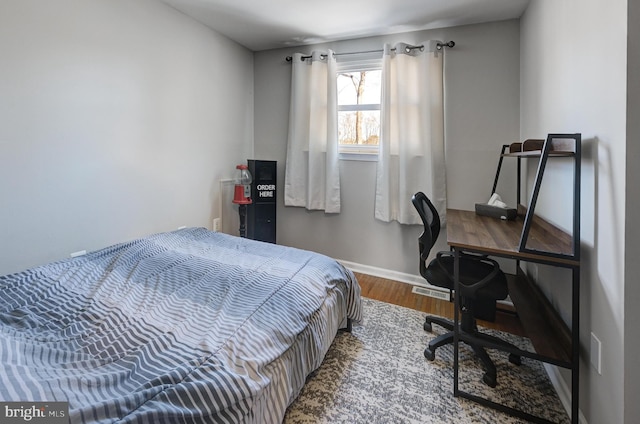 bedroom featuring hardwood / wood-style floors