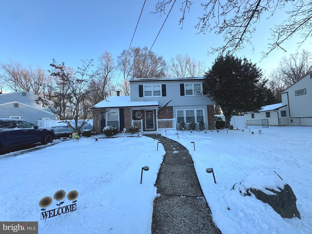 view of front property featuring a porch