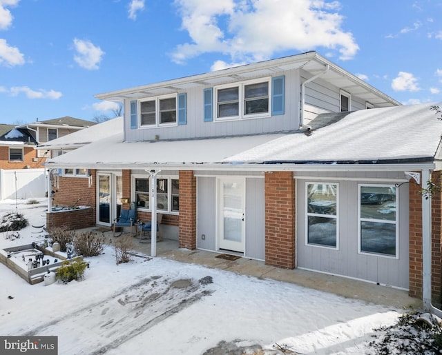 view of snow covered property