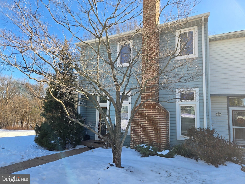 view of snow covered property