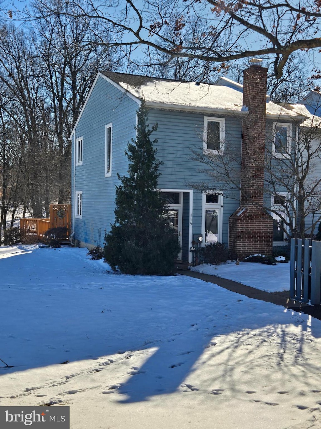 view of snow covered property