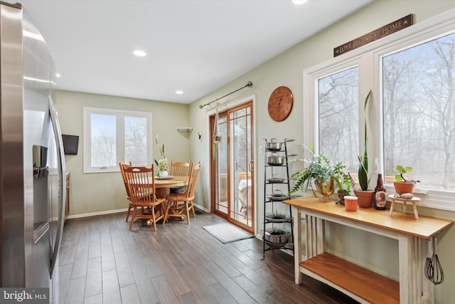 dining area featuring dark wood-type flooring, recessed lighting, and baseboards