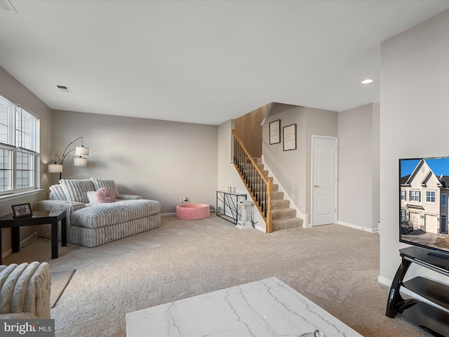 living room featuring carpet floors