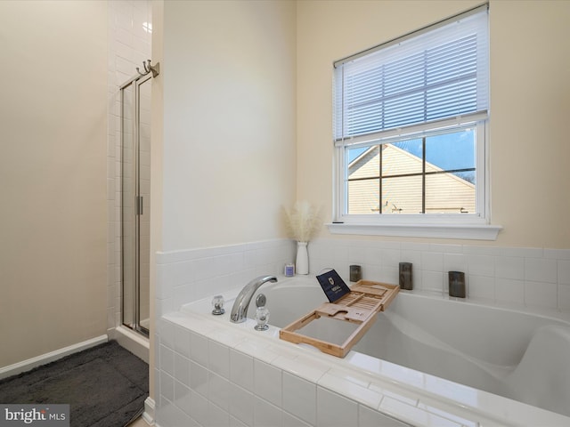 bathroom with separate shower and tub