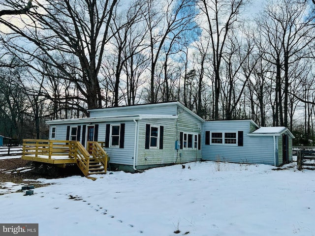 view of front of home with a wooden deck