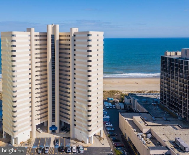 aerial view featuring a beach view and a water view