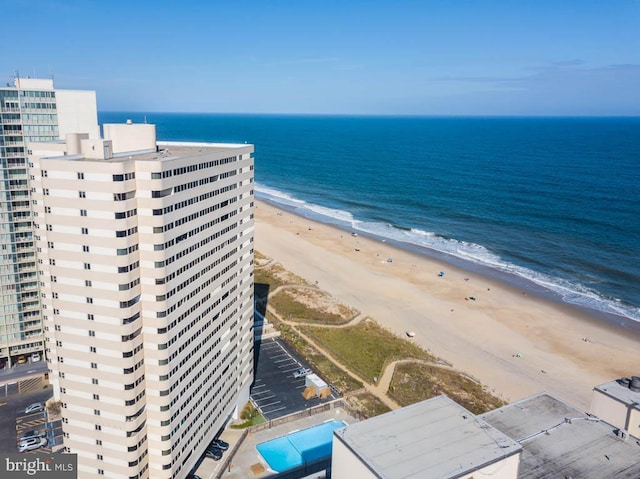 bird's eye view featuring a water view and a view of the beach