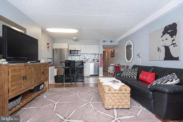 living room with hardwood / wood-style floors