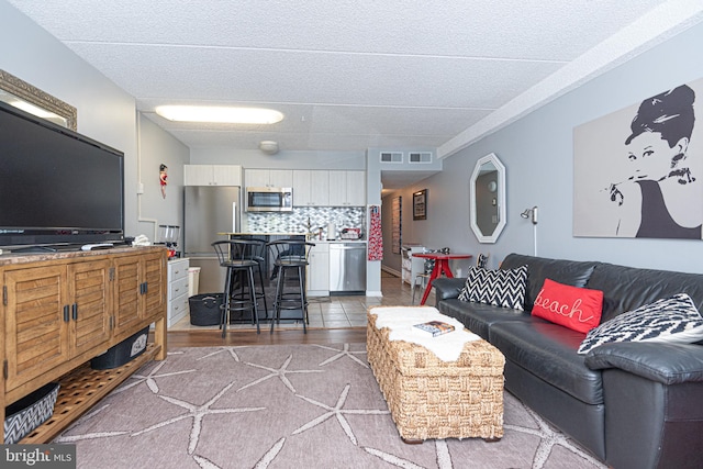 living room with wood-type flooring