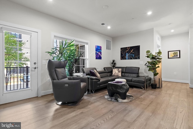 living room featuring light wood-type flooring