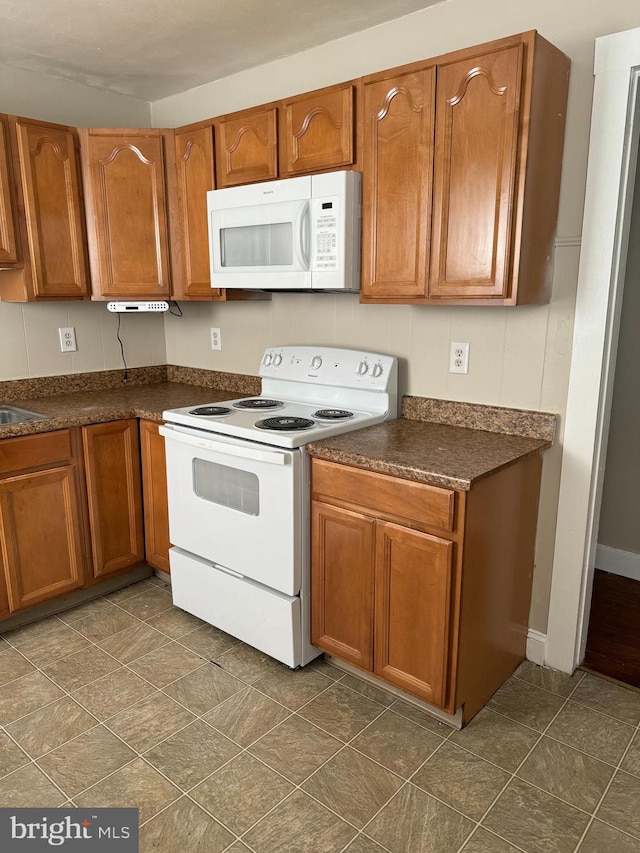 kitchen featuring white appliances