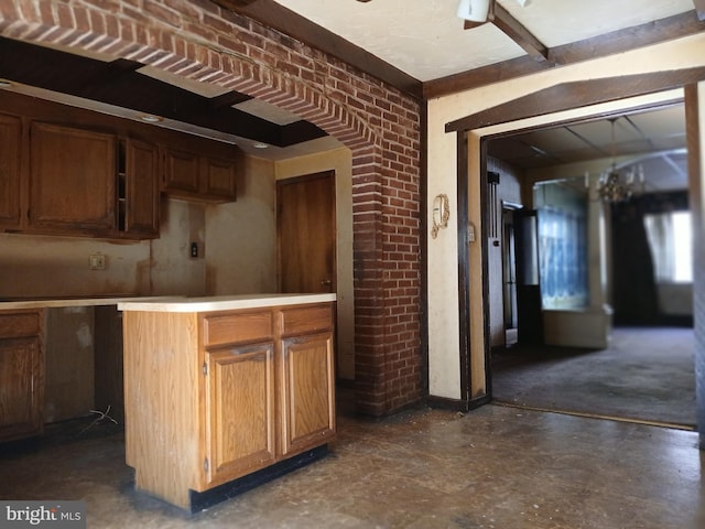 kitchen with brick wall