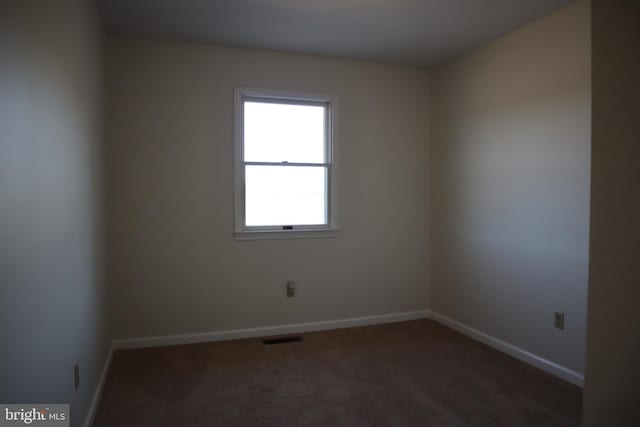 view of carpeted spare room