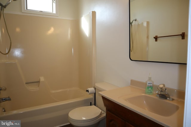 full bathroom with shower / bathtub combination, vanity, and toilet