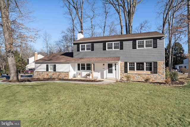 view of front of house with a front lawn