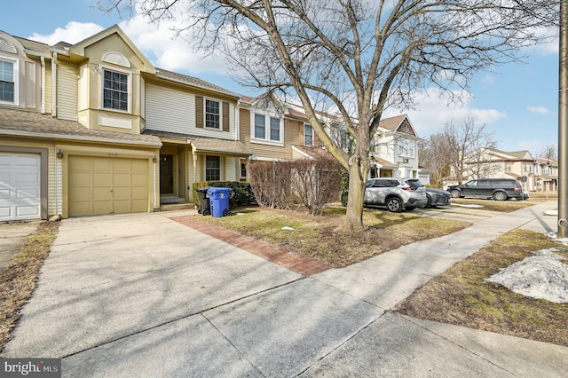 townhome / multi-family property featuring a garage