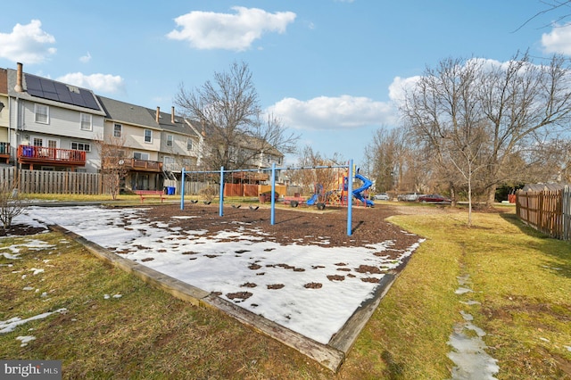 view of jungle gym with a lawn