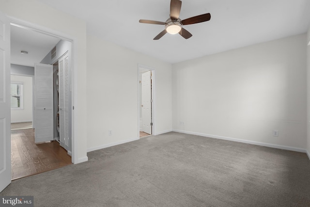 unfurnished room featuring carpet floors and ceiling fan