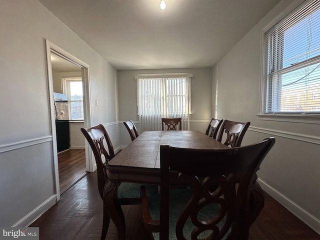 dining space with a healthy amount of sunlight