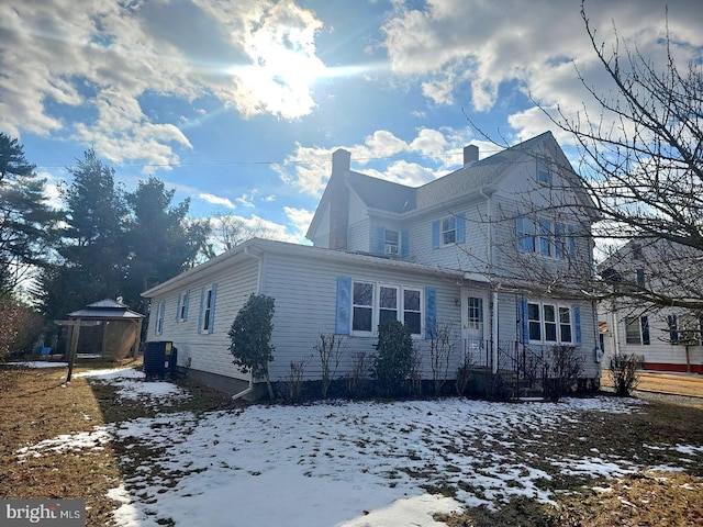 view of front of property with central AC unit