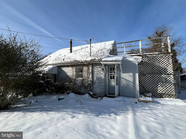 view of snow covered property