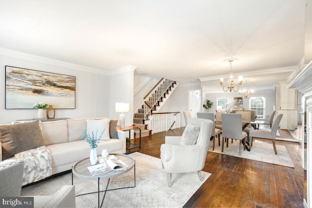 living room featuring an inviting chandelier, crown molding, and dark hardwood / wood-style floors