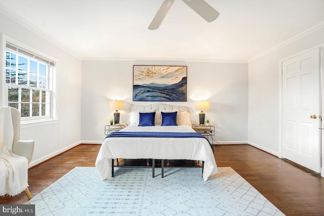 bedroom with crown molding, ceiling fan, and dark hardwood / wood-style floors