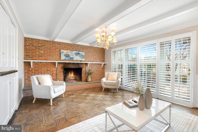 living room with beamed ceiling, parquet flooring, brick wall, and a fireplace