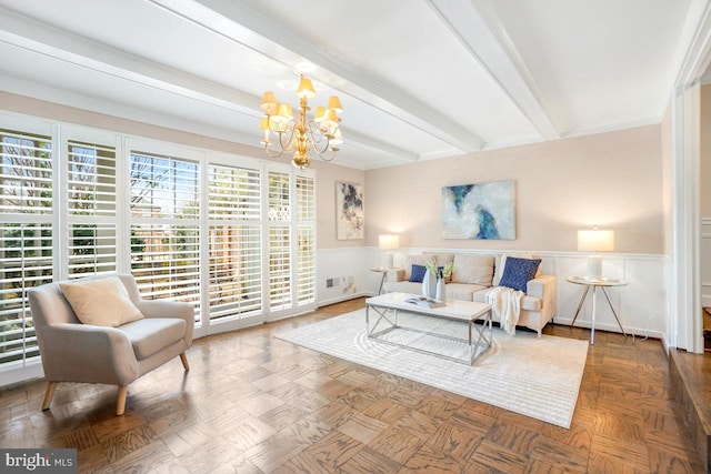 living room with beamed ceiling, parquet floors, and a chandelier