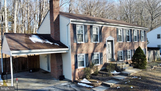 view of front of home with a carport