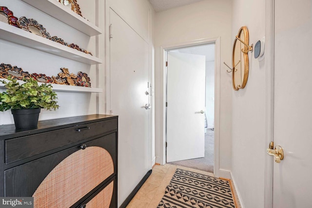 interior space featuring light tile patterned flooring