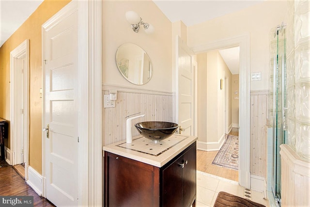 bathroom featuring vanity and hardwood / wood-style floors