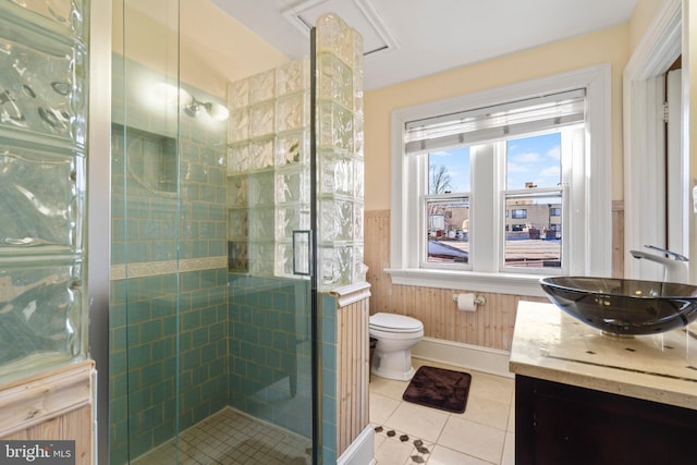 bathroom with vanity, an enclosed shower, tile patterned floors, and toilet