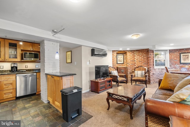 living room with an AC wall unit and brick wall