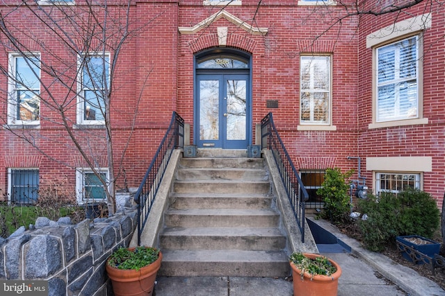 entrance to property featuring french doors