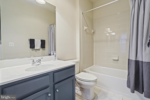 full bathroom with shower / tub combo with curtain, tile patterned floors, toilet, and vanity