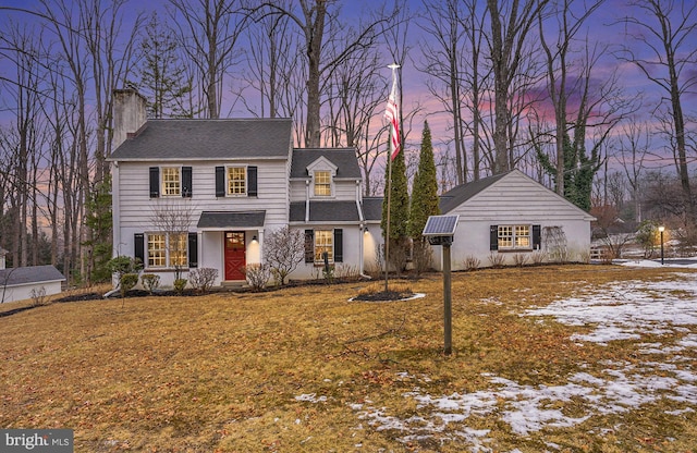 view of front of house featuring a yard