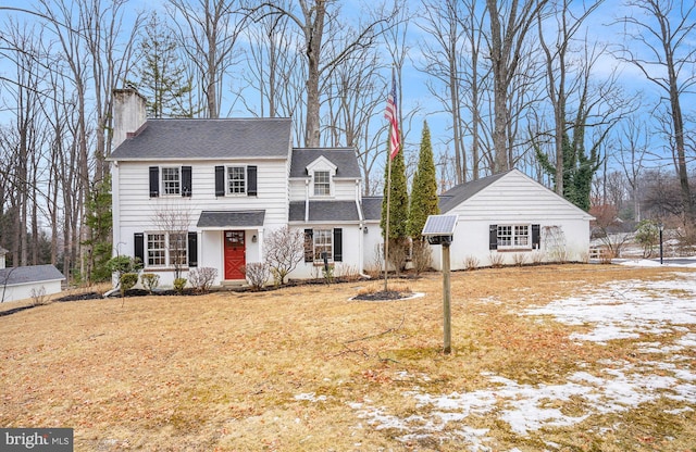 view of front of home with a lawn