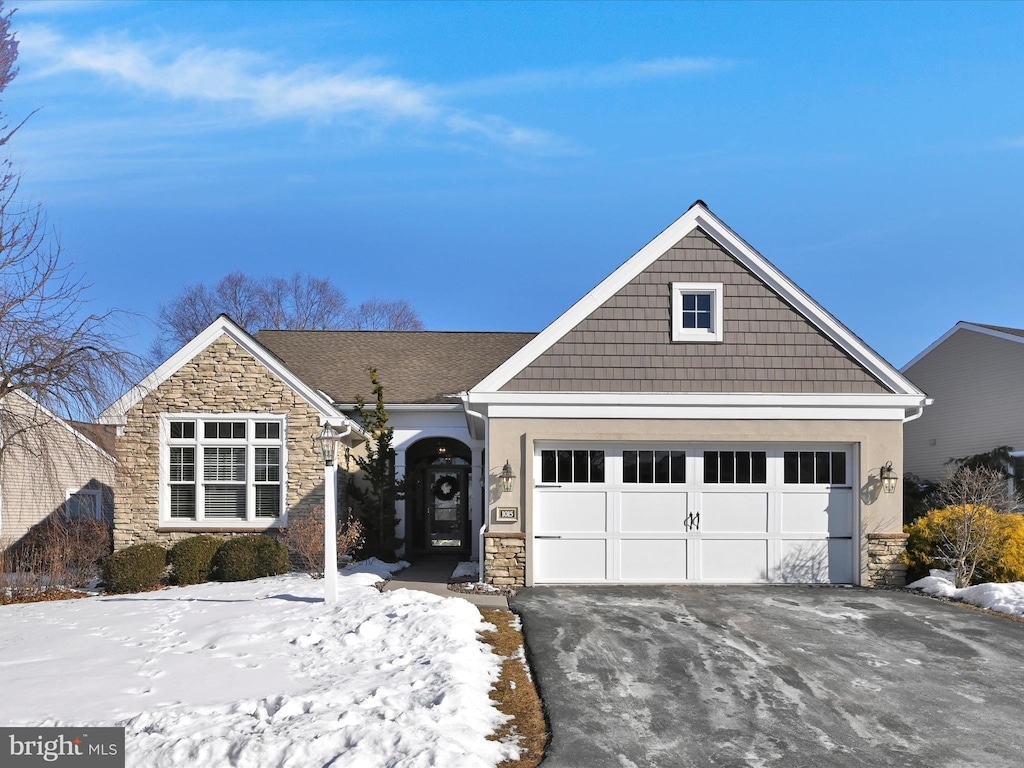 view of front of property with a garage