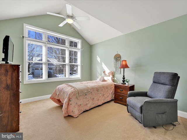 bedroom featuring light carpet, vaulted ceiling, and ceiling fan