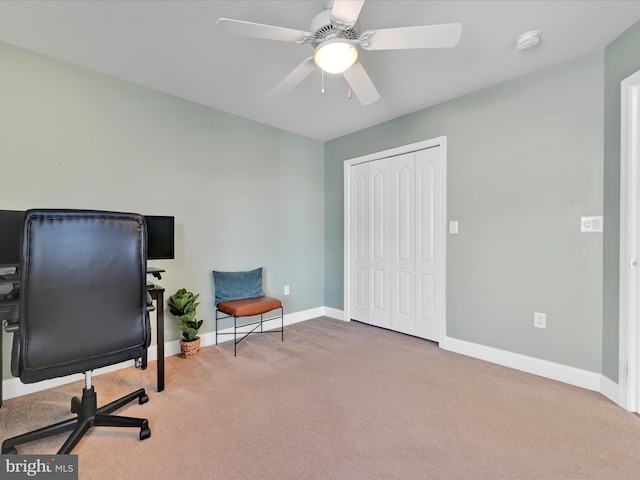 home office featuring carpet flooring and ceiling fan