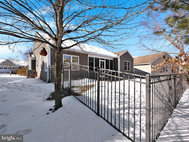 view of snow covered property