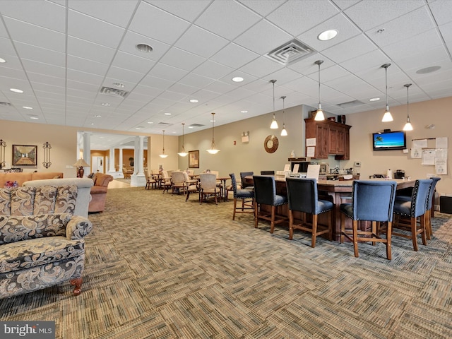 view of carpeted dining area