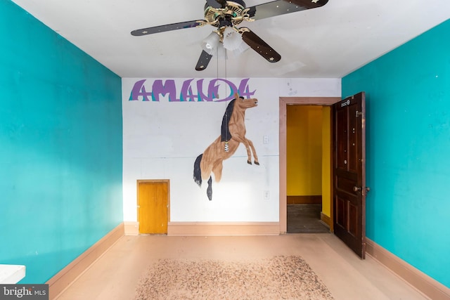 unfurnished room with ceiling fan