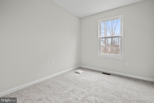 view of carpeted spare room