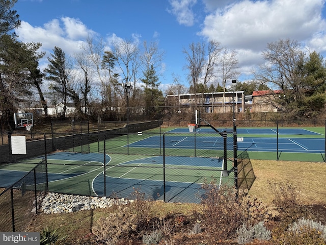 view of basketball court with tennis court